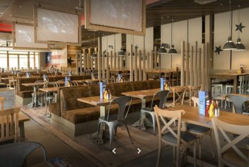 Visit Huck’s American Bar & Grill